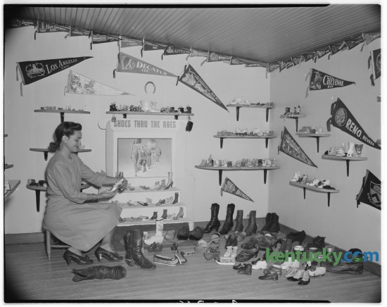 Gertrude Burke of Lexington was pictured with her shoe collection in September 1946. Burke, who lived on Sandersville Pike,  kept her collection in a special "shoe house" at the rear of her home in which was housed her collection of 445 pairs of shoes. Published in the Lexington Herald September 26, 1946. Herald-Leader Archive Photo