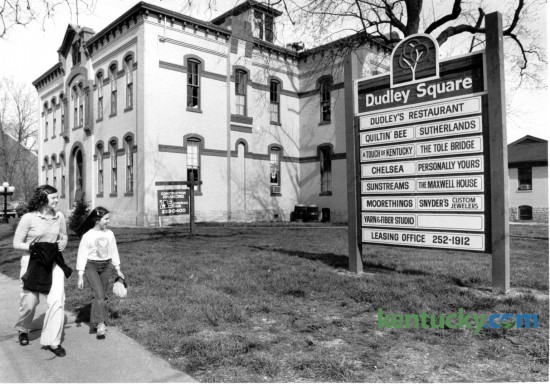 Betty Ann Ring and her cousin Lisa Hall, 9, both of Lexington walked past the old Dudley School building on April 12, 1982. The school building at the corner of East Maxwell and Mill Streets had been converted into a restaurant and shopping destination called Dudley Square. Photo by David Perry | Staff