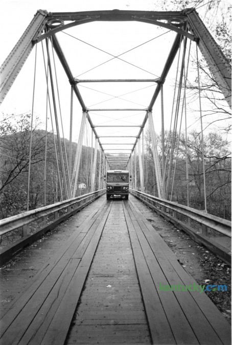 A truck crossed the one-lane bridge on Ky 2014 over the Cumberland River near Fourmile in Bell County on November 7, 1985. At that time the state transportation department was preparing to offer it for sale prior to it being replaced. It was built 1873 by the Louisville Bridge and Iron Company and replaced in 1993. Photo by Jim Wakeham | Staff