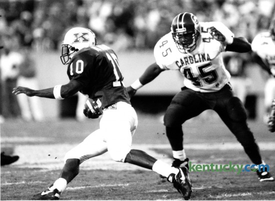 Kentucky running back Moe Williams found some running room against South Carolina during the first half at Commonwealth Stadium on September 24, 1994. UK lost the game 23-9 under fifth year head coach Bill Curry. Kentucky finished the season with one win and 10 losses. Williams left Kentucky after the 1995 season with a career total of 3,333 rushing yards in three seasons (an average of 5.4 yards per carry on 618 attempts), along with 38 receptions for 313 yards (8.2 per catch) and 27 touchdowns. He went on to play in the NFL for 10 years, all but one with the Minnesota Vikings. Photo by Mark Cornelison | Staff