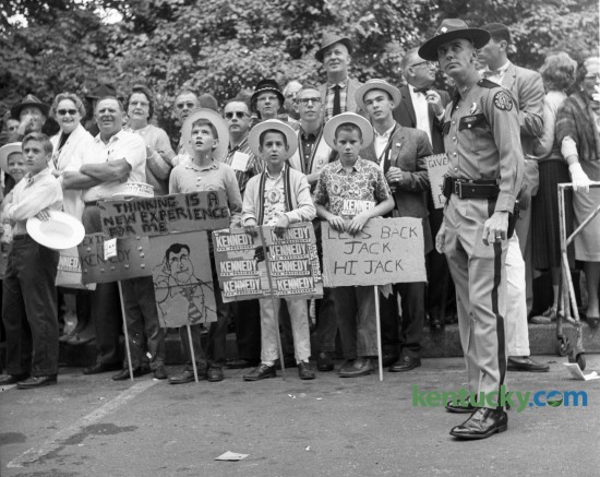 A Kentucky State Trooper and supporters of Democratic presidential candidate Sen. John F. Kennedy awaited his arrival on the University of Kentucky campus as he made a campaign stop in Lexington on October 8, 1960. Herald-Leader Staff Photo