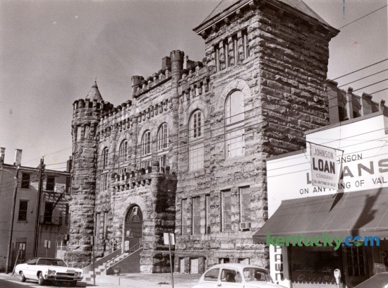 The old Fayette County Jail at 113 East Short Street in Lexington in the fall of 1976, after it's closing. This jail, built of cut stone from Rowan County,  was completed for $40,000 in 1891 and received its first prisoners on July 21, 1891. It was closed in 1976 when a new Fayette County Detention Center was completed on what was then Walnut Street and it was demolished in November 1977. GenTel purchased the property and used it as an employee parking lot. Photo by David Perry | Staff