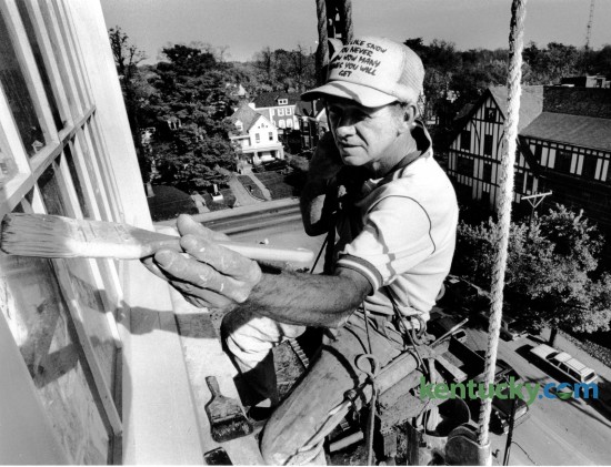 Billy Young, with B.L. Madden and Son, hung from the sixth floor of the Woodlands Condominiums where he was painting windows on October 31, 1984. The Woodlands, at  408 East Main Street, is a nine-story condominium building that was completed in 1984. Photo by Charles Bertram | Staff