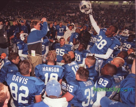 Kentucky coach Hal Mumme, left, and Jermaine White (28) led the team's celebration after defeating Mississippi State 37-35 at Commonwealth Stadium November 7, 1998. In Mumme's second season the Wildcats went 7-5 and lost to Penn State in the Outback Bowl on January 1, 1999. Photo by David Perry | Staff