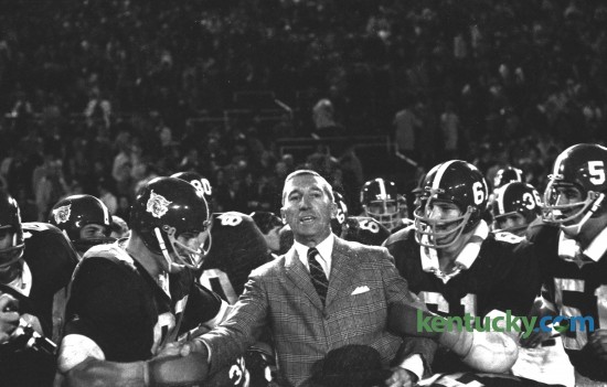 Kentucky football players prepared to put Coach Charlie Bradshaw on their shoulders to carry him off the field after UK defeated Auburn 17-7 at Stoll Field/McLean Stadium in Lexington on October 1, 1966. This was the last time Kentucky defeated Auburn at home. UK did beat Auburn at   Jordan–Hare Stadium in 2009. Herald-Leader Archive Photo