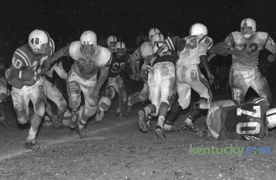 Madison's Freddie Ballou returned a punt for a 75 yard touchdown against the Elizabethtown Panthers in the Recreation Bowl in Mt. Sterling, Ky., October 30, 1961. Madison claimed the Class AA Region 2 championship with a convincing 39-0 blasting of the Elizabethtown Panthers. Herald-Leader Archive Photo