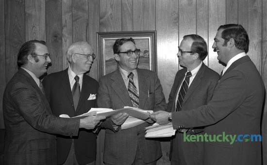 Mayor Foster Pettit, second from right, and the rest of his ticket filed petitions March 28, 1973 to insure thier names being on the ballot for mayor and councilmen-at-large for the urgan county government. From left, City Commissioners Willaim Hoskins and Dr. J. Farra Van Meter, Charles Baesler, county clerk, Mayor Pettit, and County Commissioner Doc Ferrell. In 1971, Pettit was elected as the mayor of Lexington, a non-partisan position which he held from 1972 to 1978. He and Fayette County Judge Robert Stephens oversaw the consolidation of the municipal and county governments in 1974. Herald-Leader Archive Photo ÒFive good menÉ.for a changeÓ   from left, after Dad Ð Bill Hoskins, Richard Vimont, Dr. Farra VanMete, and Scott Yellman. Pettit ticket files petitions for ballot.  L3/28/73