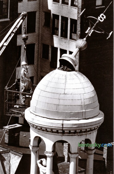 Workers inspected the damaged directional vane on the cupola roof of the Fayette County Courthouse on June 22, 1981. A severe thunderstorm two days earlier caused more than $2 million in damages in and around Lexington due to strong winds. Photo by Ron Garrison | Staff