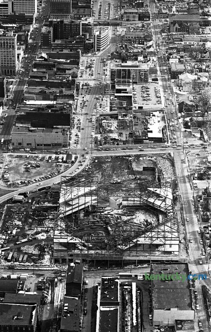 Aerial photo of downtown Lexington, January 1975. At the bottom is the Lexington Center and Rupp Arena construction. What would later become Triangle Park is just to the left and above the construction. Vine Street is visable up the middle of the photo. Just to the right of that is High Street, running from the bottom to the top pof the picture. Photo by E. Martin Jessee | staff