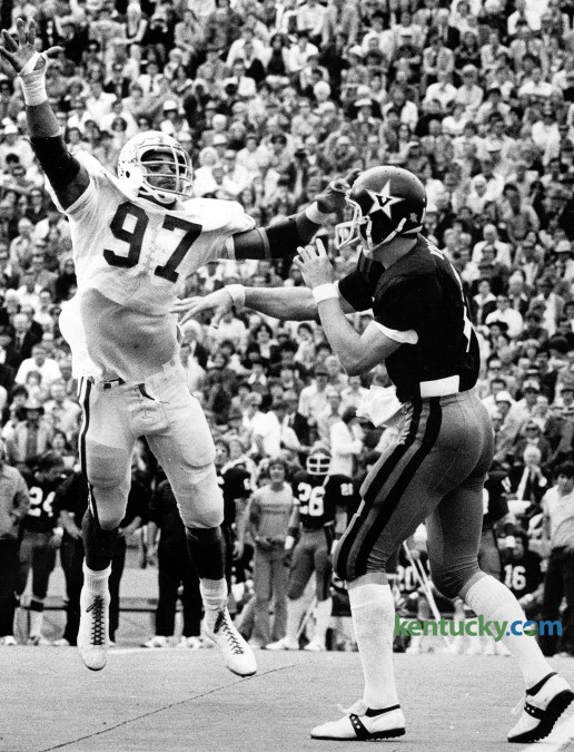 University of Kentucky football player Art Still pressured Vanderbilit quarterback Mike Wright Nov. 5, 1977 in Nashville. UK won 28-6. Still was inducted into the College Football Hall of Fame Dec. 8, 2015 in New York City. Originally from Camden, N.J., Still played at Kentucky from 1974-77 under coach Fran Curci. He helped the Wildcats to a 19-4 record in his final two seasons. Photo by Ron Garrison | Staff