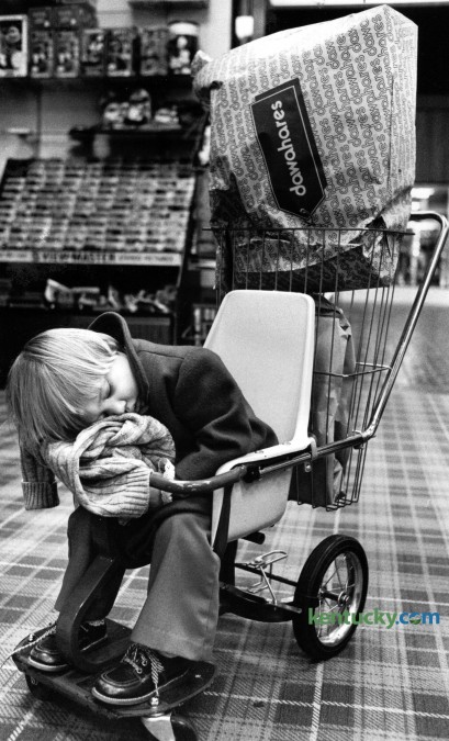 Two-year-old Stephanie Danielle Cole, from McKee, slept while her mother did some Christmas shopping December 1979 in Lexington. Photo by  Christy Porter | Staff