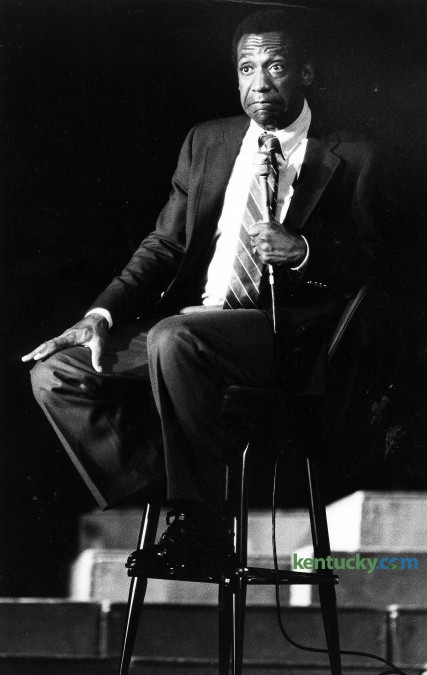 Comedian Bill Cosby performs at Rupp Arena, Sept. 12, 1981. Cosby was in town as part of IBM's 25th anniversary in Lexington celebration. The company had a series of luncheons and special events throughout the week that culminated with Cosby's performance during a Family Day program at Rupp in front of thousands of employees. Up With People, an education organization which aims to bring the world together through service and music, also performed during the two-hour show. Photo by Ron Garrison | staff