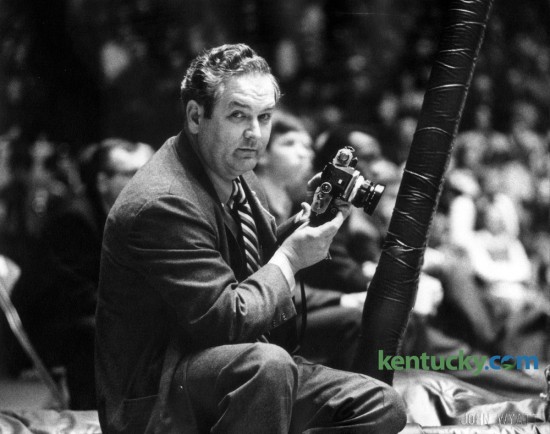 Former Herald-Leader photographer E. Martin Jessee, photographed by Leader chief photographer John C. Wyatt at the University of Kentucky men's basketball game against Miami of Ohio in Memorial Coliseum, December 29, 1969. Jessee was probably the most well-known news photographer in Lexington during his 40 year career. He was a sharp dresser, raced to news scenes in a Cadillac or Lincoln, was very competitive, aggressive when he needed to be, and the main thing was: He always got the shot. He loved breaking news and sports, especially the Kentucky Derby and UK basketball. This blog wishes to recognize Jessee as the Kentukcy News Photographers Association begins its annual meeting today at the Hyatt. Jessee retired in 1984, a year before the association was formed. Photo by John C. Wyatt | Staff
