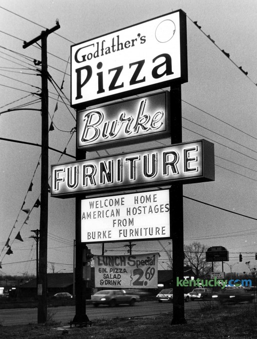A sign at 2950 Richmond Road in Lexington, Jan. 20, 1981, celebrating the realease of 52 Americans held hostage by Iran for 444 days. The Iran hostage crisis began Nov. 4, 1979 after the U.S. Embassy in Tehran was taken over. Today, Burke furniture is still located on Richmond Road, however this location for Godfather's Pizza closed in the late 1980's. Note in the background - towards the lower right side of the photo - is a Kroger grocery store that has since moved down Richmond Road, closer to the Man o'War Boulevard intersection. Photo by Charles Bertram | staff