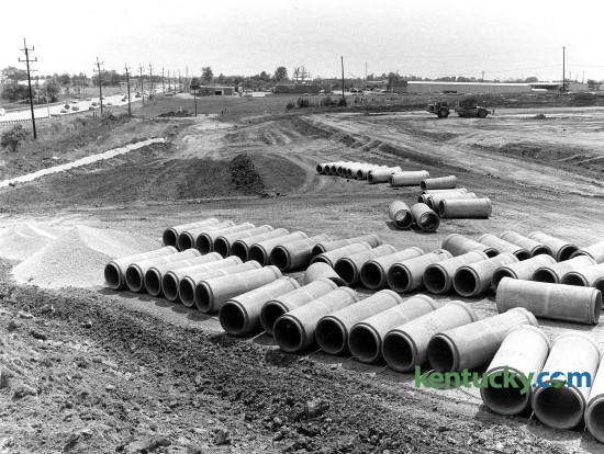 Storm and sanitary sewer construction along Nicholasville Road, shown at left, May 8, 1985. The area show is just south of Fayette Mall, around what is now the Courtesy Acura dealership and Bella Notte restaurant. In the background, West Tiverton Way can bee seen running horizontally across the picture. Visible it is Brecher's Lighting store, which is there today and a Lowe's home improvement store. This location closed when a newer, bigger Lowe's was built just up the road in a shopping center near the Man o'War intersection in the spring of 1998. Click on the image for a larger view. Photo by David Perry | staff