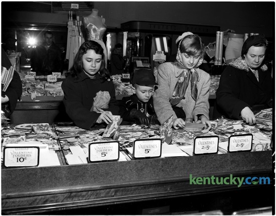 Children shop for Valentines at the S.S. Kresge & Company five and dime store at 250 West Main Street in Lexington, Feb. 1951. From left are Sara Smith, Paul Leonard and Shirley McQueen. The chain store opened in 1912 in Lexington and was a favorite venue for thrifty family shopping. After an expansion and re-opening in 1947, The Lexington Leader credited the store with changing Lexingtonians attitudes towards chain stores. The store closed in 1967 and is now the site of the Lexington Financial Center, more commonly known as the "Big Blue Building". The S.S. Kresge Company was later renamed the Kmart Corporation in 1977. Published Feb. 8, 1951 in the Lexington Leader. Herald-Leader archive photo