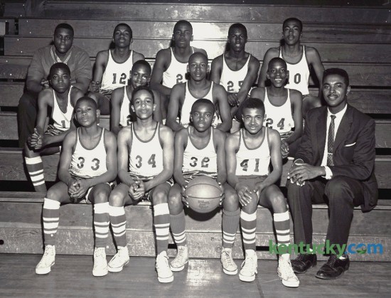 Dunbar Junior High wound up its season with a 50-25 win over University Junior to record a perfect 10-0 Blue Grass Conference mark in February 1961. The Bearkittens, who were beaten just once in 18 games this season, are: Front row--Cecil Craig, Dave Cruse, Robert Washington, Theodore Berry, and Coach Harry N. Sykes.  Second Row--Richard Gentry, Eugene Krank, Russell King, and Jerry Gentry.  Back Row--Johnny Edwards, manager; James Berry, George Wilson, Richard Green, and James Jackson. Published in the Lexington Leader Feb 24, 1961. Herald-Leader Archive Photo