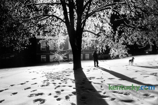 Transylvania graduate Susan Montgomery and her dog Kodi walked across the ice covered Transy campus late one evening in January 1979 after an ice storm had moved through Lexington. Photo by Ron Garrison | Staff