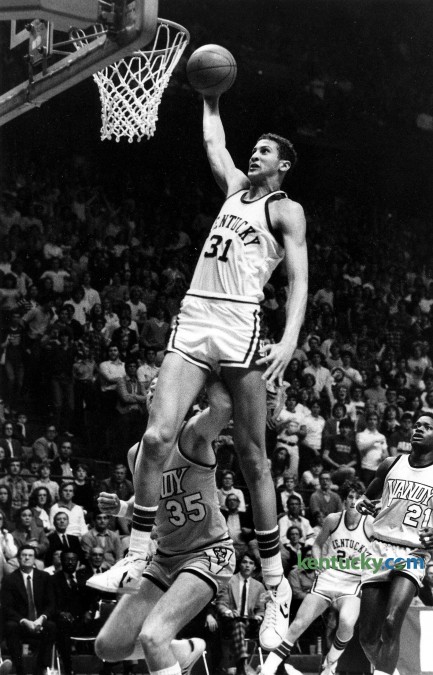 Kentucky center Sam Bowie slammed home two of his game-high 19 points during a 80-48 Wildcat win over Vanderbilt, Feb. 21, 1981 at Rupp Arena in Lexington. The sophmore also pulled down 15 rebounds in the win for the 10th ranked Wildcats, who were only up by two at the half, 26-23. UK wen on to finish the season 22-6, but lost their last two games of the year - one in the SEC tournament and the other in their opening NCAA Tournament game. Bowie had to sit out the follwing two seasons because of stress fracture in his left tibia. He returned for the 1983-84 season and finished his three-year Wildcat career wirh 1,285 points, currently 30th on UK's all-time career points list. Photo by Charles Bertram | staff