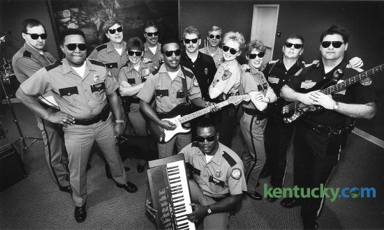 In 1993, Lexington police officer Debbie Wagner, fourth from the left, organized the DARE 911 Band, which used rock music to spread an anti-drug message to area schools. The group, photographed on Feb. 9, 1993, were made up of members of The Lexington Police, Fayette Co. Sheriff's Dept., University of Kentucky Police, and the Horse Park Police. Wagner, a 38-year veteran of the force known for community outreach, retired from the Lexington police force in January, 2016. Photo by Charles Bertram | staff