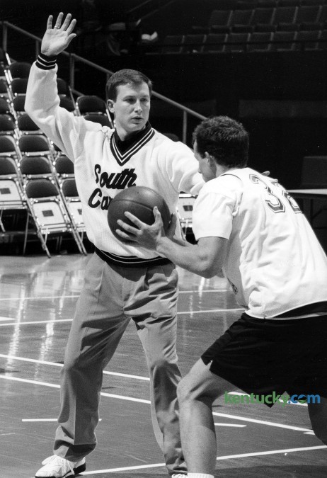 Brian Lane, then an assistant basketball coach at South Carolina, guarded player Brad Hinson during practice before the SEC Tournament, March 10, 1993 at Rupp Arena in Lexington. Lane has been the coach at Transylvania University in Lexington since 2001. The Lexington native was an assistant at Transey under his college coach and father Don Lane during the 1990-91 season. For the next 10 years Lane was an assistant at five different Division I schools, including this one year at South Carolina. While coaching at Transey, he is the only coach in league history to win HCAC Coach of the Year four times and is the fastest coach to 200 wins in schooll history. Lane has led the Pioneers to 20 or more wins four times and qualified for the NCAA National Tournament five times. Photo by Frank Anderson | staff