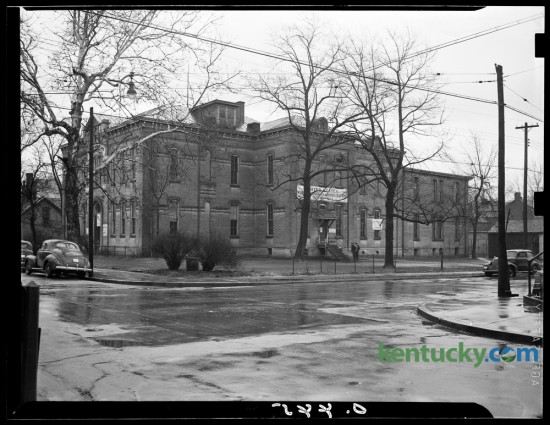 The old Dudley School property, photographed on January 22, 1941, on the northeast corner of Mill and Maxwell Streets, had been sold at public auction by the city board of education.  The structure was built in 1881.   Published in the Lexington Herald January 23, 1941. Herald-Leader Archive Photo