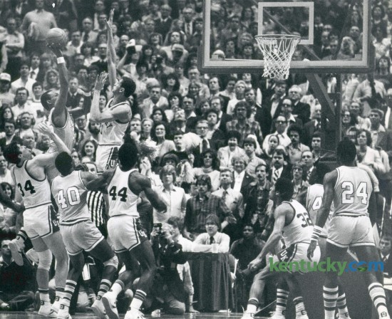 Kentucky's Sam Bowie rose to block the game's final shot by LSU's Howard Carter as the ninth-ranked Wildcats knocked off the No. 2 Tigers on March 1, 1981, in Rupp Arena. The UK win prevented LSU from completing an undefeated SEC season. Bowie finished the game with 11 points, nine rebounds and four blocks. Photo by David Perry | Staff