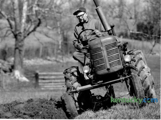 Forrest McGinnis, 72, took advantage of warmer weather on March 4, 1987 to start plowing for his tobacco crop on his 70 acre farm in Mercer County. He said he planned to grow approximately 2000 pounds of tobacco that year on his farm that was located on US 68 between Harrodsburg and Perryville. Photo by Charles Bertram | Staff