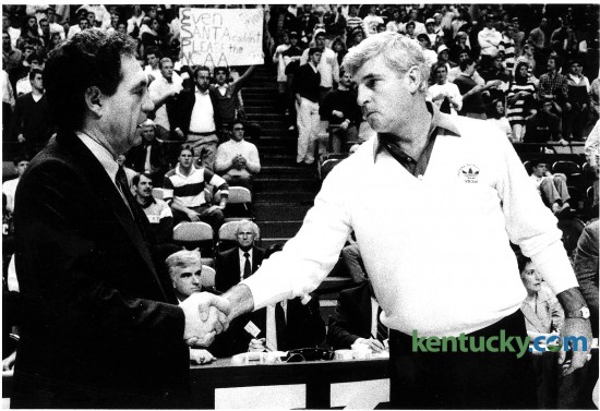 University of Kentucky coach Eddie Sutton, left, shook hands with Indiana University coach Bobby Knight prior to their Dec. 20, 1988 game at Rupp Arena in Lexington. The Hoosiers would win the game, 75-52, holding only one UK player in double-figures (22 points from Chris Mills). During his 29 years at Indiana, Knight had a 15-18 record against UK, including a 1-2 mark against the Cats in the NCAA Tournament. For the second time in five years, Kentucky and Indiana — the long-running border rivalry that is no more — will play on college basketball’s biggest stage, the NCAA Tournament. The two schools played each other annually from 1969-70 until 2011-12. Photo by Michael Malone | staff