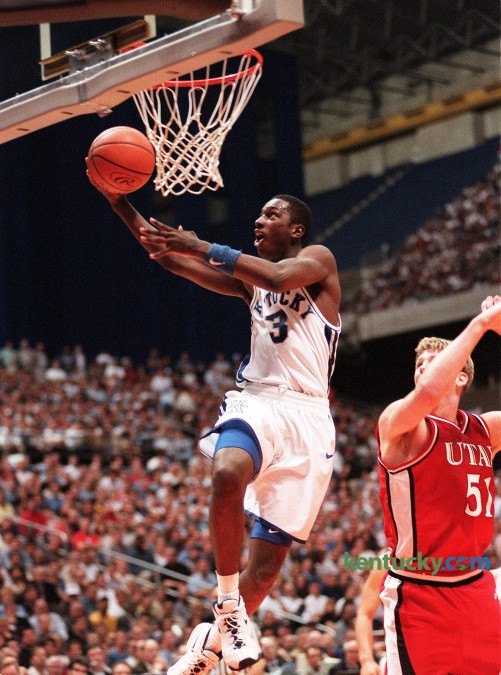 Kencuyk's Allen Edwards goes up for a layup against Utah's Micheael Doleac during the Cats' 78-69 win in the NCAA Championship game, March 30, 1998 at the Alamodome in San Antonio, Texas. Edwards, a senior and one of three team captains, scored four points in the win that gave the Cats their seventh national titile. Edwards was promoted to head coach at Wyoming, March 21, 2016. Photo by Janet Worne | staff