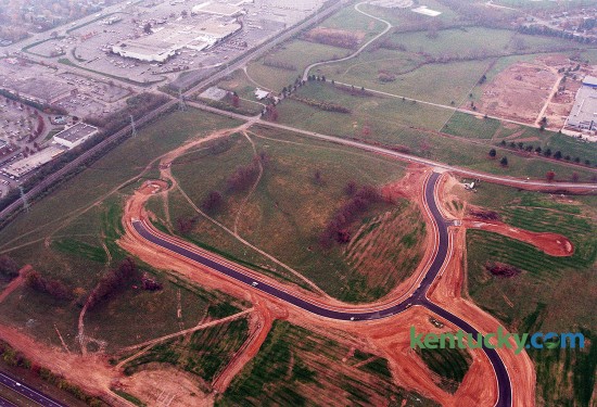 Aerial view of development between Reynolds Road (running left to right across the middle) and New Circle (lower left corner) in Lexington, Nov. 19, 1998. The road being built would become Ruccio Way and a Meijer supermarket would open on the site in 2000. Meijer paid $10.7 million for land on the former RJ Reynolds Tobacco property, which would become their second Lexington location. Reynolds Road was widened soon after the store opened. In the upper left corner is Fayette Mall. In the upper right is construction of Lexington Christian Academy. The high school opened two months later in January of 1999. Photo by David Stephenson | staff