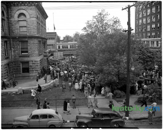 An estimated 3,000 people attended a community memorial service April 14, 1945 outside the Fayette County Courthouse in honor of President Franklin Delano Roosevelt. FDR as he more commonly know, died while in office two days earlier from a stroke. Harry Truman then became the 31st President of the United States. Religious leaders and politicians spoke during the service before a crowd that stood motionless and mute, even during a downpoor of rain which forced the ceremony to move inside the courthouse from Cheepside Park. The ceremony ended with mourners singing "God Bless America". Published in the Sunday Herald-Leader April 15, 1945. Herald-Leader archive photo