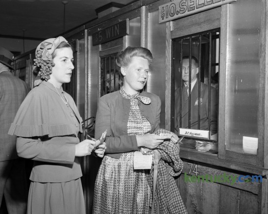 Mrs. Samuel Walton Jr. and Mrs. Wickliffe Johnstone prepared to place their bets during the Keeneland Spring meet in April of 1949.  Published in the Lexington Leader April 19, 1949. The Spring 2016 meet continues at Keeneland through Friday April 29. Herald-Leader Archive Photo