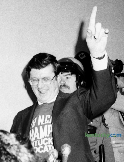 UK coach Joe B. Hall greeted fans as the NCAA National Champion UK Wildcats arrived at Blue Grass Field (Airport) March 28, 1978. Kentucky defeated Duke 94-88 in the championship game in St. Louis the night before. Some 7,000 fans waited inside the airport terminal for the team to arrive. This year's Makers Mark bottle features Hall and the 1978 Wildcats. Several former players will be signing the bottle at Keeneland starting at 7:30am today. Photo by Ron Garrison | Staff