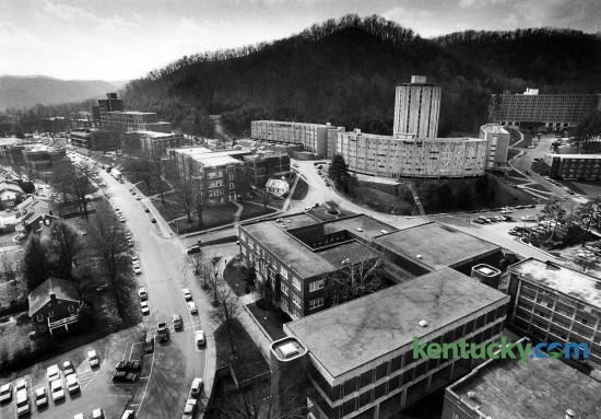 The campus of Morehead State University, Feb. 27, 1991. University Boulevard runs up the left side of the photo. The tall buidling in the upper right side is Mignon Tower, a 15-story coed residence hall for 300 students. The curvy buildings surrounding it are also dorms. Enrolment was 8,600 around the time of this photo. Today there are more than 11,000 students enrolled at the eastern Kentucky school, located in the foothills of the Daniel Boone National Forest in Rowan County. Photo by Charles Bertram | staff