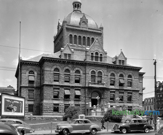 Fayette County Courthouse in early June 1949. Yesterday Lexington city officials announced several businesses that may lease space in the renovated courthouse when it reopens in the Spring of 2018. This photo was unpublished but was probably taken to help illustrate the city's vote on an ordinance to lift the ban on parking on Main Street between the hours of 4:30pm and 6pm. The board of city commissioners voted four to one on June 2 to restore the parking after most of the businesses on Main Street signed a petition presented by the Chamber of Commerce in support of lifting the ban. After a 60-day trial the merchants claimed the parking ban was hurting their businesses. The purpose of the parking ban experiment had been to relieve traffic congestion during rush hour and had been supported by the Blue Grass Automobile Club and the Lexington police department. Herald-Leader Archive Photo