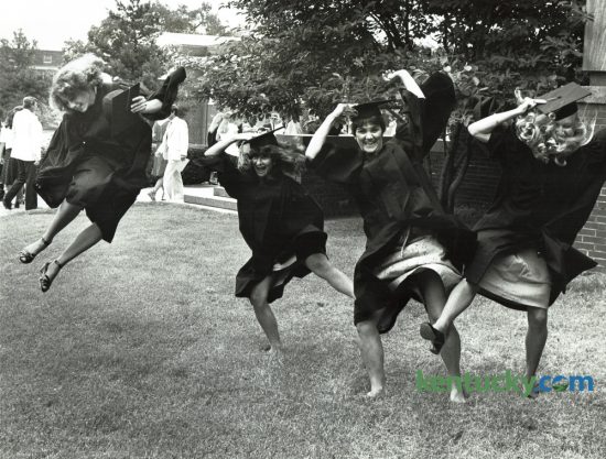 Transylvania University graduating seniors, from left, Susan Amato of Lexington, Michelle Jackson of Maysville, Amy Black of Pikeville and Kim Siebers of Fulton, N.Y. jumped for joy in anticipation of receiving their degrees May 31, 1981 at Transylvania's commencement. Poet Wendell Berry was principal speaker at the ceremony in Haggin Auditorium, at which 156 students received diplomas. This morning at 9am Transylvania University will award 270 degrees to the class of 2016. Photo by David Perry | Staff