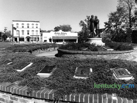 Constitution Square in downtown Danville, Oct. 25, 1985. The historic site marks the birthplace of Kentucky's statehood. In 1790, Kentucky delegates at the site accepted Virginia's terms for separation from the state. On June 1, 1792, Kentucky became the fifteenth state in the union. A bronze statue depicting the state seal is the centerpiece in a circle of plaques dedicated to each Kentucky governor. The state insignia depicts two friends embracing, representing the motto ''United We Stand, Divided We Fall.'' In the background is Burke's Bakery, which has served Danville for four generations. Danville residents buy Burke's famous butter flake rolls by the dozen to put in their freezers. Another popular item the barkey is known for is their salt-rising bread. They are also popular for their doughnuts, and gingerbread men. Photo by Frank Anderson | staff