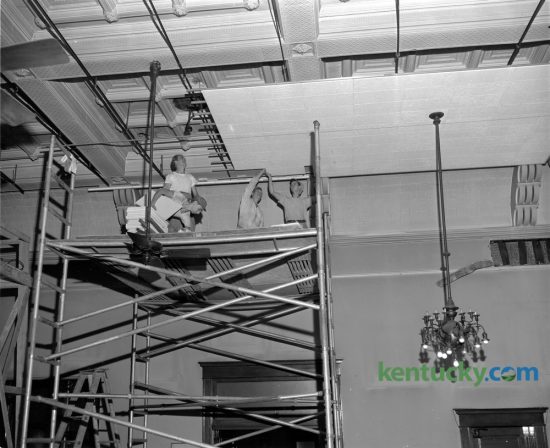 Workers were placing a new ceiling in the circuit courtroom of the Fayette courthouse on September 8, 1949. This was the first in a series of proposed improvements for the judicial chambers. The new ceiling is designed to give better acoustics and will have a level surface instead of the ornate ceiling. The last trial was held in the courthouse in 2002, and the Lexington History Center opened in 2003. During 2012, the courthouse was closed to the public because paint and asbestos were found in the upper floors. Restoration of the building is currently underway.  Published in the Lexington Herald September 9, 1949. Herald-Leader Archive Photo