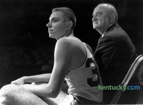 Adolph “Herky” Rupp Jr., left, and his father, legendary University of Kentucky basketball coach Adolph Rupp watch a 1959 team practice. Herky grew up around UK basketball and played three seasons for his dad, scoring 11 points in 14 career games from 1959 to 1962. He died June 22, 2016. Herald-Leader archive photo