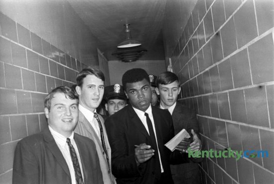 Heavyweight champion Muhammad Ali shown as he was leaving Freedom Hall in Louisville after a 6-round charity exhibition fight with Doug Jones October 27, 1966. UPI called it "humiliating" for Jones, who had hoped a good showing might get him a rematch. In 1963 Jones  lost a 10-round decision to the young Cassius Clay in a sold-out Madison Square Garden. Published in the Lexington Herald October 30, 1966. Herald-Leader Archive Photo