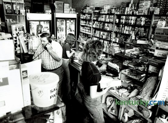 Joe Ballard, owner of Ballard's Market,  took a phone order in his store on Jefferson Street in June of 1978. He was one of the few small store owners who still offered home delivery in the neighborhood. The building no houses the Gray Goose Restaurant.  Photo by Christy Porter | Staff