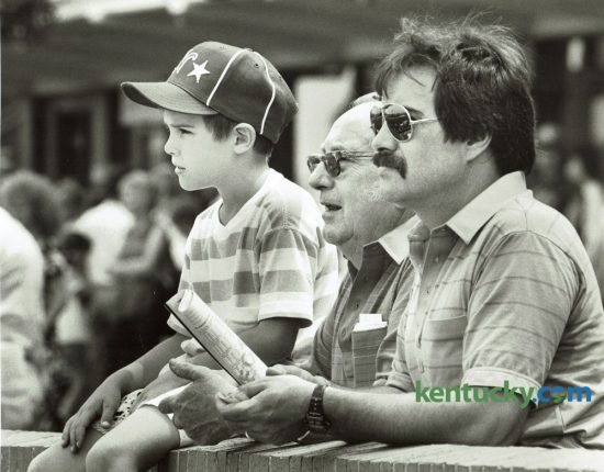 Chad Morgan Batten, 7, his grandfather Frank Batten, Jr. and his father Frank Batten III enjoyed a Father's Day outing at the Red Mile on Sunday June 19, 1988. The Standardbred race track had some special festivities for fathers, including the naming of a Father of the Year. Bobby White of Corbin, a father of six, got the award based on a letter written by his daughter Darlene. Photo by Craig Sands | Staff