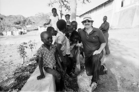 Lexington Leader columnist Don Edwards posed with a group of kids in Ranquitte, Haiti in April 1982. Edwards and Herald-Leader photographer Ron Garrison accompanied a Christian Flights International missionary group from Kentucky who operated a medical and dental clinic in the village. Edwards, who retired in 2001 chronicled life in the Bluegrass with passion, wit and humor for 22 years, died early Tuesday July 26, 2016. He was 75. Photo by Ron Garrison | Staff