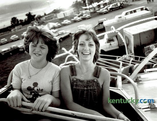 Cousins Shelia Shadoan, left, and Terri Shadoan reacted to one of the midway rides on the opening day of the Lion's Blue Grass Fair at Masterson Station Park June 14, 1982. This year's fair opens today at Masterson Station Park. Photo by Charles Bertram | Staff