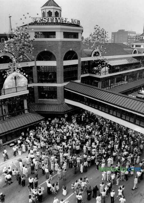 A large crowd was on hand as hundreds of balloons were released to signal the grand opening the Festival Market on July 25, 1986. The grand opening for $16 million development at West Main Street and North Broadway kicked off 10 days of festivities that allowed the public to become acquainted with the shops and restaurants located inside the 3-story marketplace. About 42 of the market's 72 shops and restaurants were open. The development failed to generate sustained profit and the complex was sold for $600,000 in 1994 in an auction. Festival Market was rebranded in 1999 as Triangle Center, consisting primarily of offices with a few retail and restaurant entries. It has since been renamed as The Square. Photo by Frank Anderson | Staff