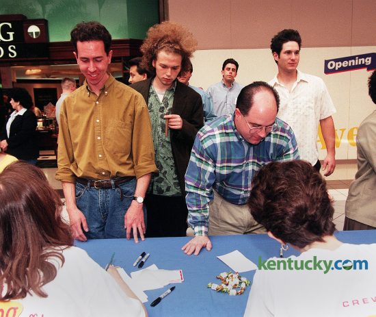 Fans of the television show Seinfeld showed up in full force May 7, 1998 for Lexington's look-alike contest at Fayette Mall. 75 people entered the contest, celebrating the popular show's finale which aired a week later. The field was narrowed to 12 Elaines, five Jerrys and four Kramers. Only one George showed up. The look-alikes won signed scripts of "The Contest" Seinfeld episode and other gifts. Frome left, Keyth Sokol, (Jerry), Willie Davis, (Kramer), Brian Staples, (George), Larry Ashlock, (Kramer) ckecked-in for the contest. Staples won for George, Ashlock for Kramer and in the background is Jason Cunningham, who won as Jerry. Photo by Mark Cornelison | staff