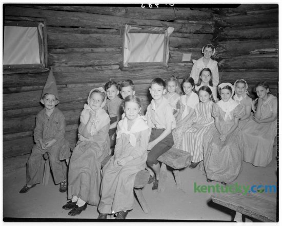 Local children portrayed a scene in a pioneer log school during a celebration of the 168th anniversary of the founding of Fort Harrod on June 16, 1942, the first Anglo-Saxon settlement west of the Alleghenies. This weekend the Pioneer Days Festival is being held at the Old Fort Harrod State Park in Harrodsburg. Photo by J.W. Spencer | Staff