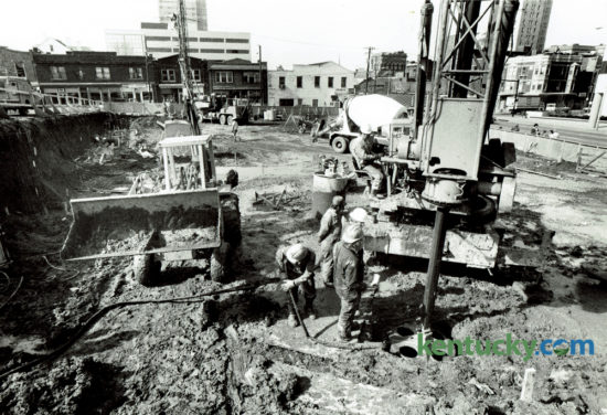 Workers with McKinney Drilling Company, Louisville, used a foundation drill to create holes that would be filled with concrete for the support piers for an eight story office building at the corner of Vine Street and Limestone on March 11, 1980. Webb Properties was the building developer and White and Congleton was the general contractor. The office building now houses Community Trust Bank and Investment Company. Photo by David Perry | Staff