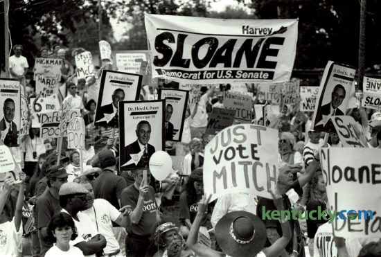 Attendees at the 110th annual Fancy Farm political picnic on August 4, 1990, at St. Jerome Catholic Church in western Kentucky displayed their support for a variety of candidates, including Harvey Sloane, a democrat running for the U.S. Senate against incumbent senator Mitch McConnell. McConnell won a tough campaign against the former Louisville mayor by 4.4%. The 2016 Fancy Farm picnic gets underway this morning. Photo by Charles Bertram | Staff